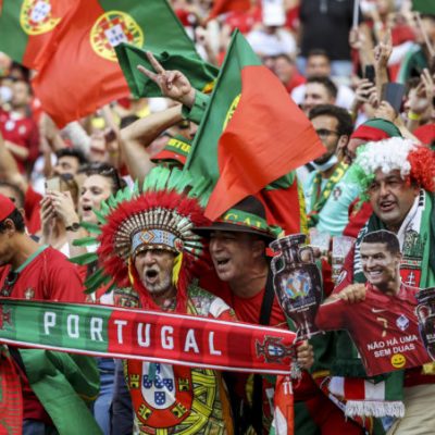Portuguese fans attend the Euro 2020 soccer championship group F match between Hungary and Portugal at the Ferenc Puskas stadium in Budapest, Hungary, Tuesday, June 15, 2021. (Bernadett Szabo/Pool via AP)